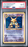 1999 POKEMON GAME 1 ALAKAZAM-HOLO SHADOWLESS - PSA 8